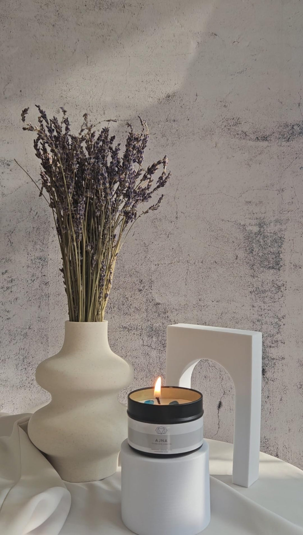 Lucir Store Healing Chakra candle with black obsidian grounds root energy and protection.