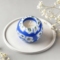 LumeTon Alan's Candle enhances living-room ambience with a warm glow.