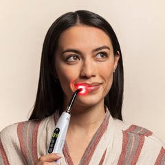 Luminance Red lip sore device close-up label highlights quality and safety features.