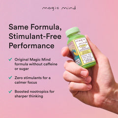 Magic Mind bottles with glass signaling a premium daily ritual.
