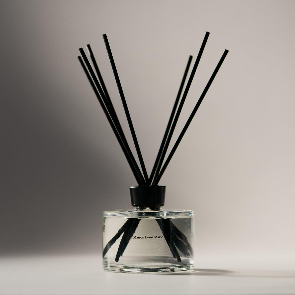 Maison Louis Marie No.13 Nouvelle Vague diffuser packaging highlights cruelty-free, vegan commitment.