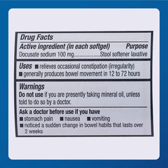 Pouring MAJOR softgels from bottle demonstrates easy daily use.