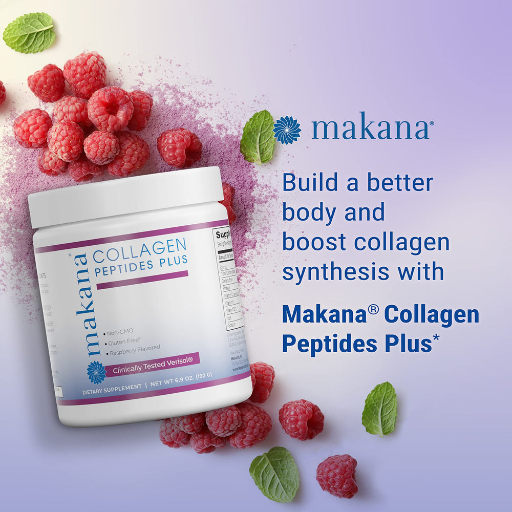 Scoop of Makana powder beside a glass with raspberry drink
