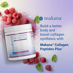 Scoop of Makana powder beside a glass with raspberry drink