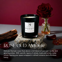 Malbella Essentials Rose Oud Amour candle in black vessel adds a modern decorative glow.
