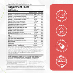 Mama Natural Organic Women's Multivitamin in hand demonstrates on-the-go use.