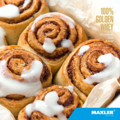 Pouring Maxler 100% Golden Whey highlights fast-absorbing formula for post-workout use.