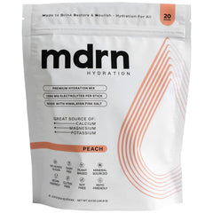 MDRN Hydration electrolyte mix tub in peach for daily hydration.