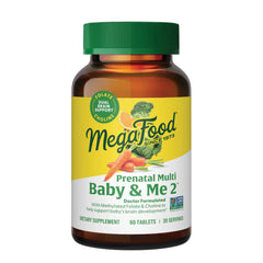 MegaFood Baby & Me 2 prenatal bottle showing two tablets for daily nutrition.