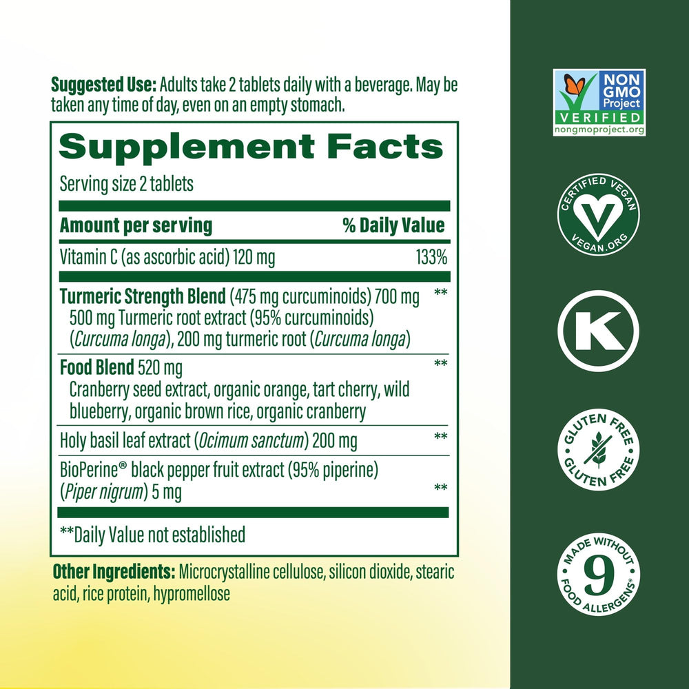 MegaFood Turmeric Curcumin tablets close-up emphasizing potency and serving size.