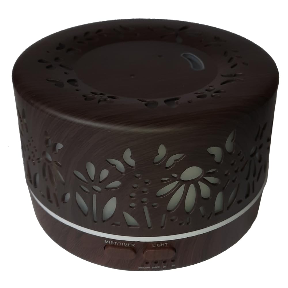 mEssentials Wild Essentials diffuser top view highlighting moon and star design and ambient lighting