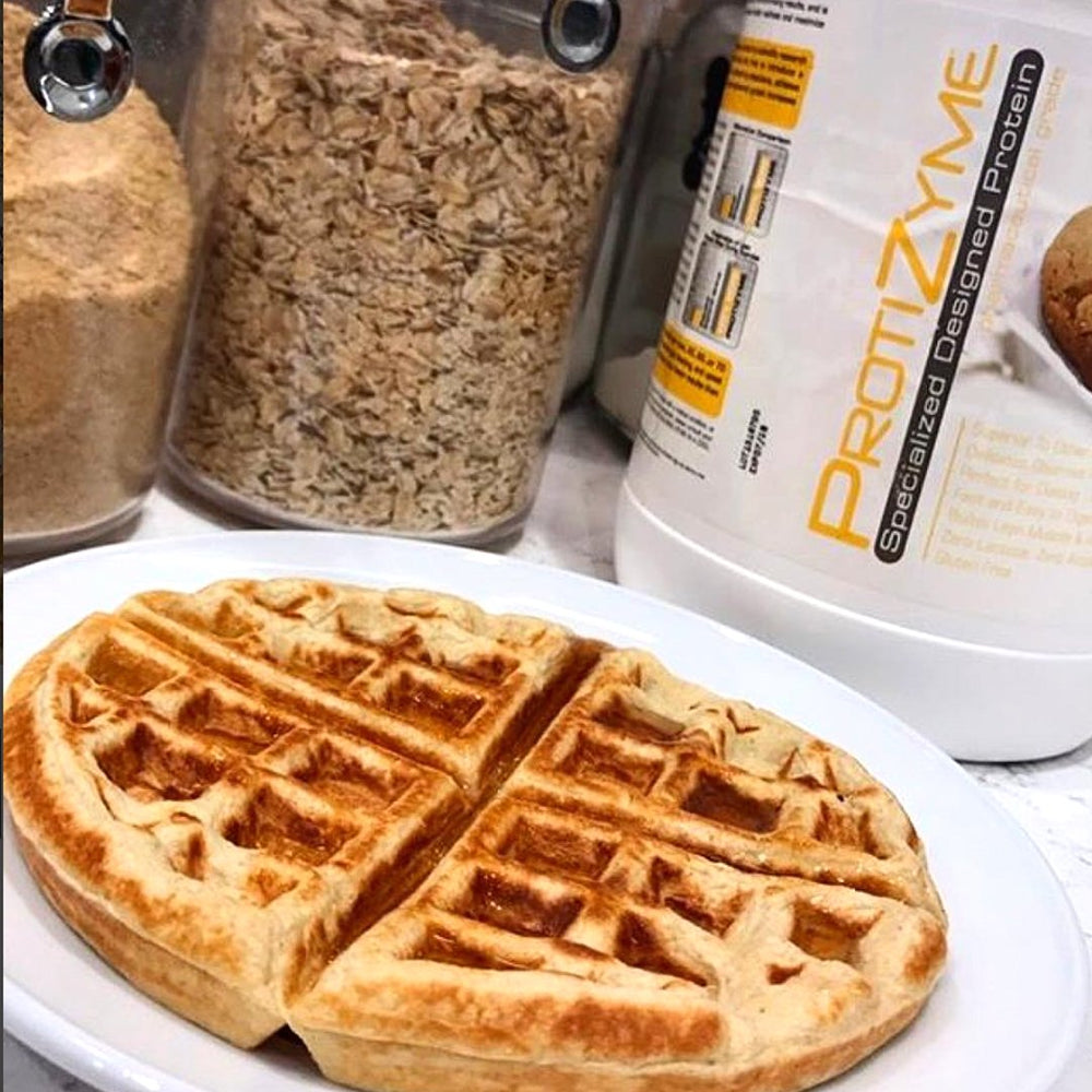Peanut Butter Cookie flavor powder in serving cup ready to blend.