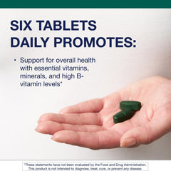 Close-up of Metagenics bottle label highlighting non-GMO and gluten-free features