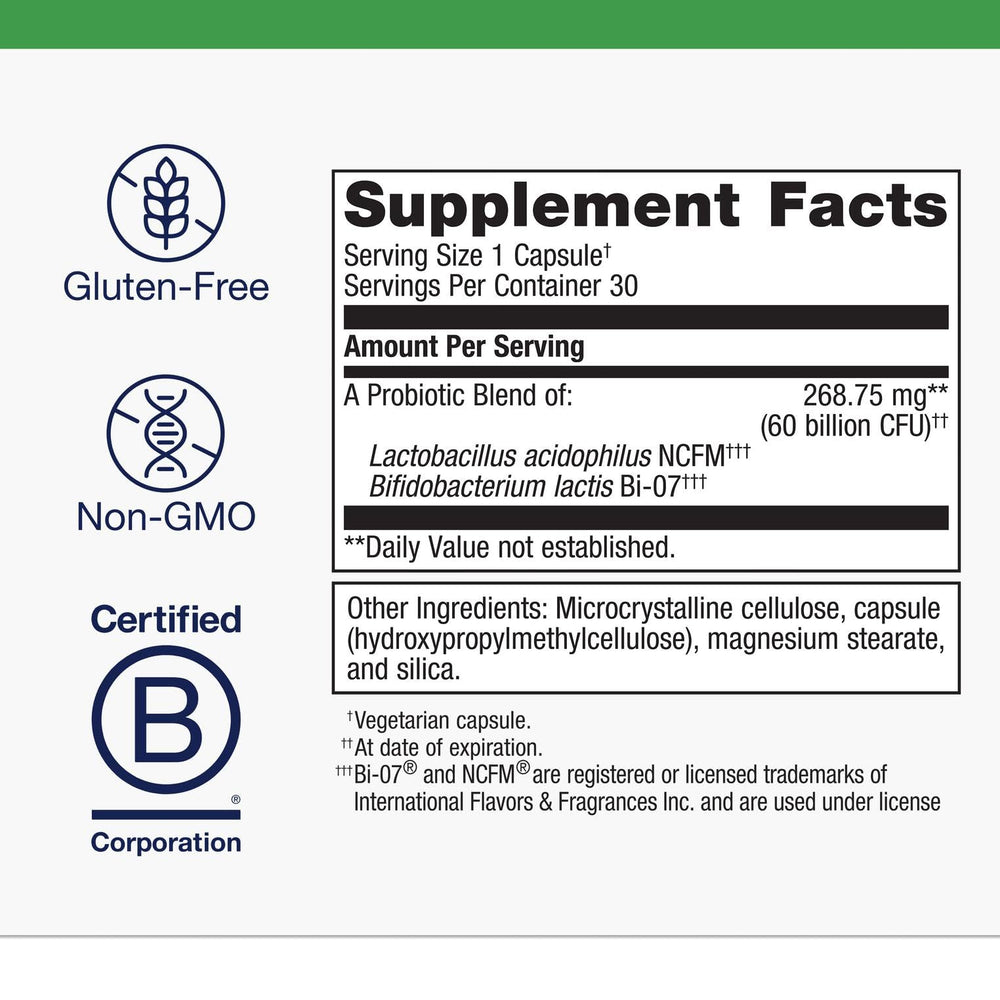 Metagenics UltraFlora IB bottle open with capsules ready for daily use.