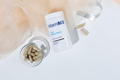 Morning routine two capsules with water featuring MiamiMD.