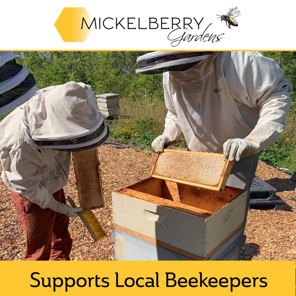 Spray action of Mickelberry Gardens Honey Propolis Throat Spray for throat discomfort