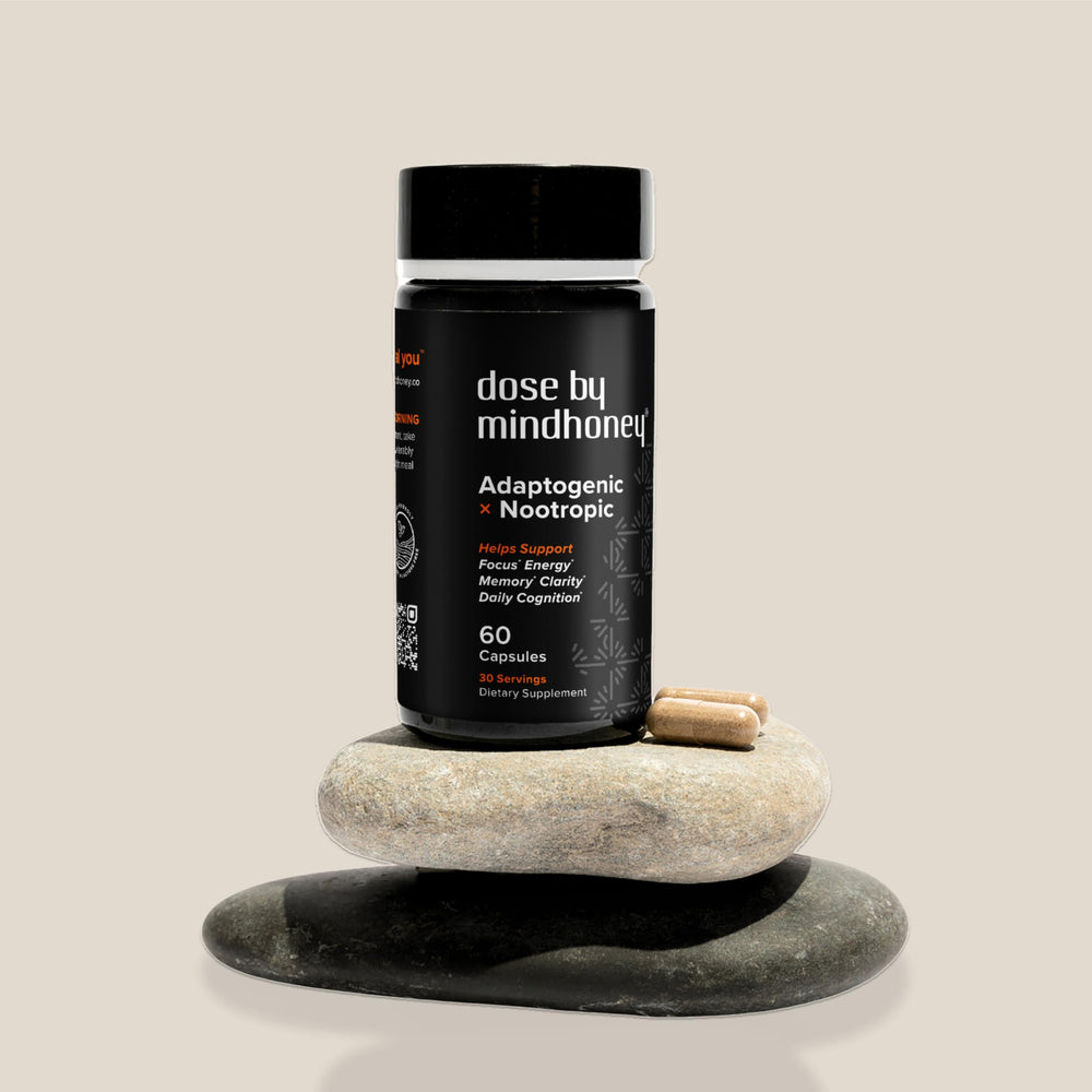 MINDHONEY DOSE on a desk setup suggests focus during work or study.