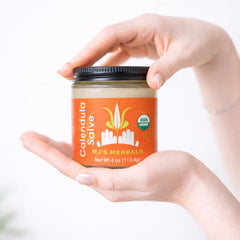 Calendula blossoms in MJ's Herbals Calendula Salve highlight organic infusion for gentle skin care.
