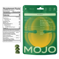 Mojo focus gummies on a desk during study or work session