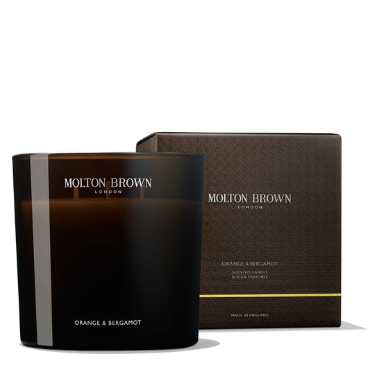 Molton Brown Orange & Bergamot triple-wick candle adds bright citrus ambience.