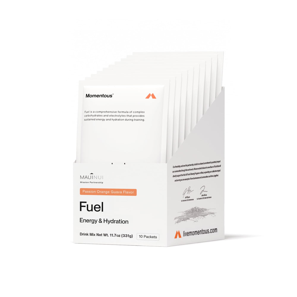 Momentous Fuel tub front view with vibrant Passion Orange Guava label, ready for training