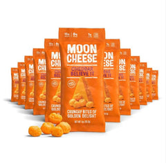 Moon Cheese Cheddar Believe It bites showcase a crunchy, high-protein snack.