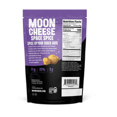 Moon Cheese Space Spice bite closeup highlights crunchy texture and bold chili flavor