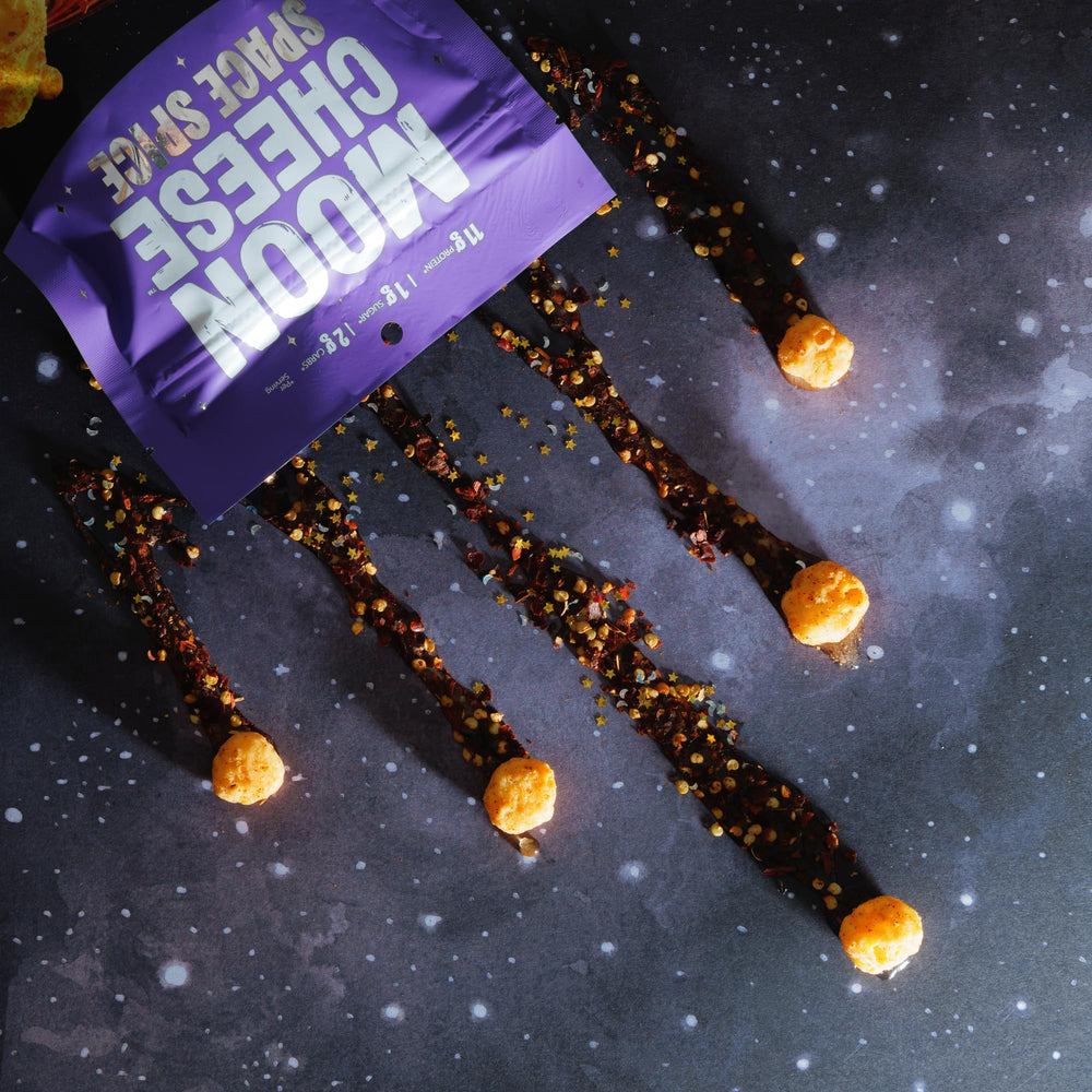 Moon Cheese Space Spice nutrition label area emphasizes gluten-free, low-sugar ingredients