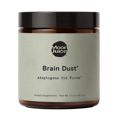 Moon Juice Brain Dust bottle closeup, showcasing sleek packaging for daily cognitive support.
