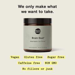 Moon Juice Brain Dust scoop-dispense demonstrates easy dosage to support mental stamina.