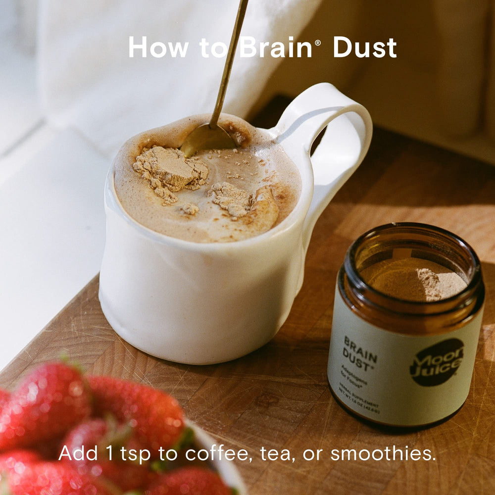 Moon Juice Brain Dust tea-cup spotlight hints at versatile usage in beverages and routines.