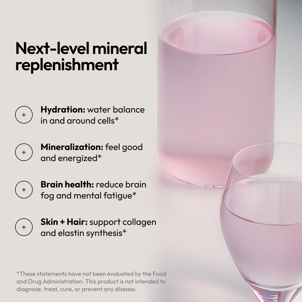 Moon Juice Mini Dew dissolving in water for refreshing hydration