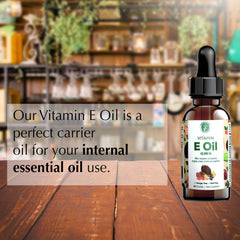 Sunflower oil blend visible in Mother Nature's Essentials Vitamin E Oil bottle.