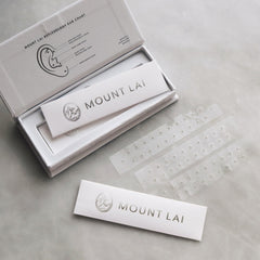 Mount Lai ear seeds sheet close-up showing peel-and-place method.