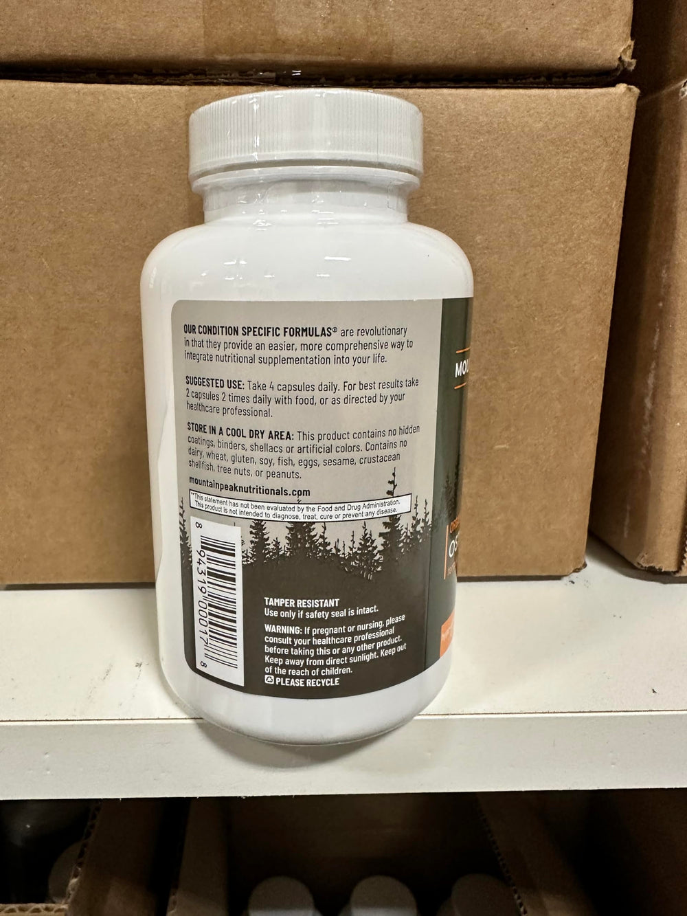 Back view of Mountain Peak Osteo bottle showing nutrition facts for bone support planning