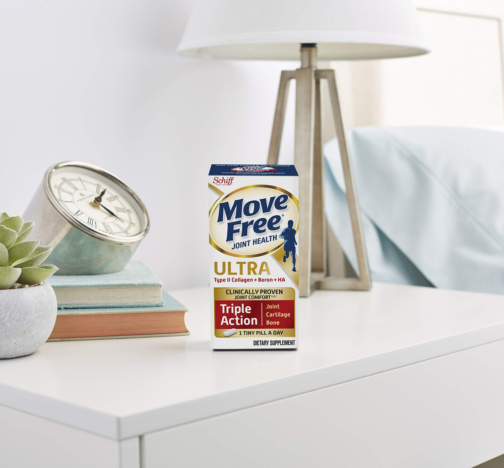 Move Free Type II pills held in hand for convenient daily use.