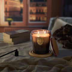 M&SENSE candle in a cozy living room creates inviting ambiance