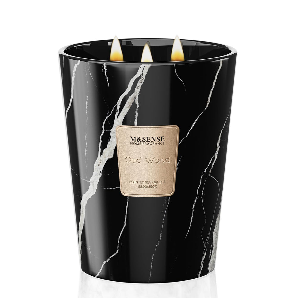 M&SENSE OudWood XL candle glows warmly for cozy evenings