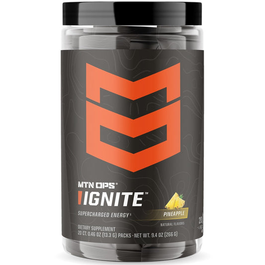MTN OPS Ignite Trail Packs powder in scoop for hike-ready energy.