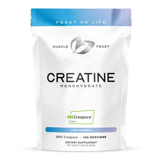 Muscle Feast Creapure bottle close-up highlighting vegan, pure creatine for clean workouts.