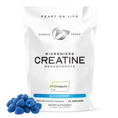 Muscle Feast Creapure powder in a jar for clean creatine supplementation.