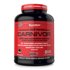MuscleMeds CARNIVOR beef protein isolate tub front in Rocket Pop flavor showing 23g protein for muscle recovery