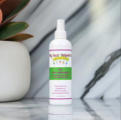 Kids applying MY HAIR HELPERS Mint Detangler ensures easy combing.