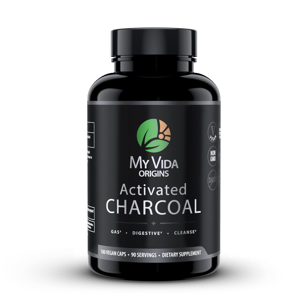 My Vida Origins bottle with activated charcoal capsules promotes gentle detox support.
