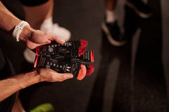 Athlete using the gel during training for quick energy and focus