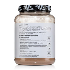 Scoop beside the NAKED Whey Isolate tub showing 30 g protein per serving