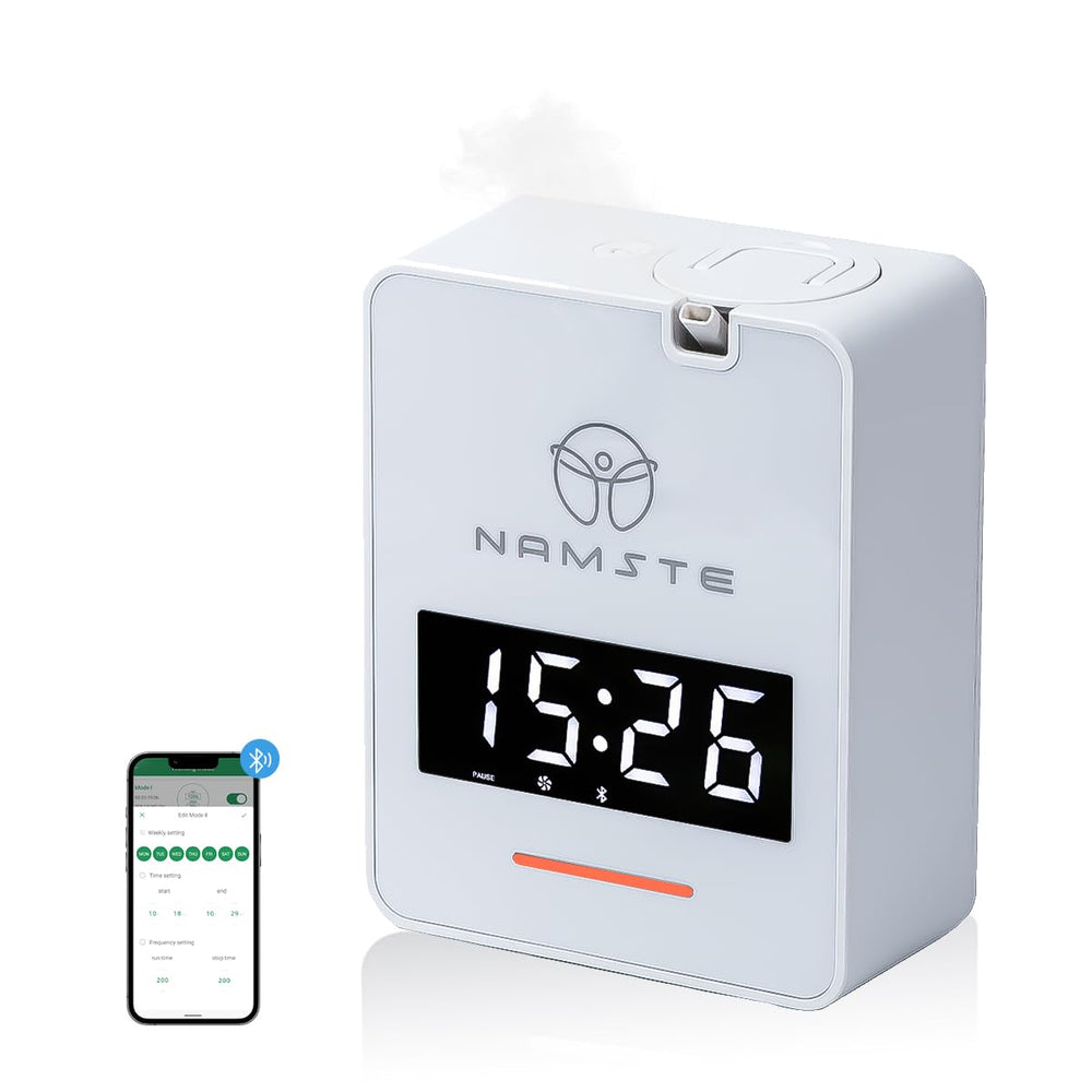 Namste waterless diffuser clock display for quiet, timed aroma in living spaces.