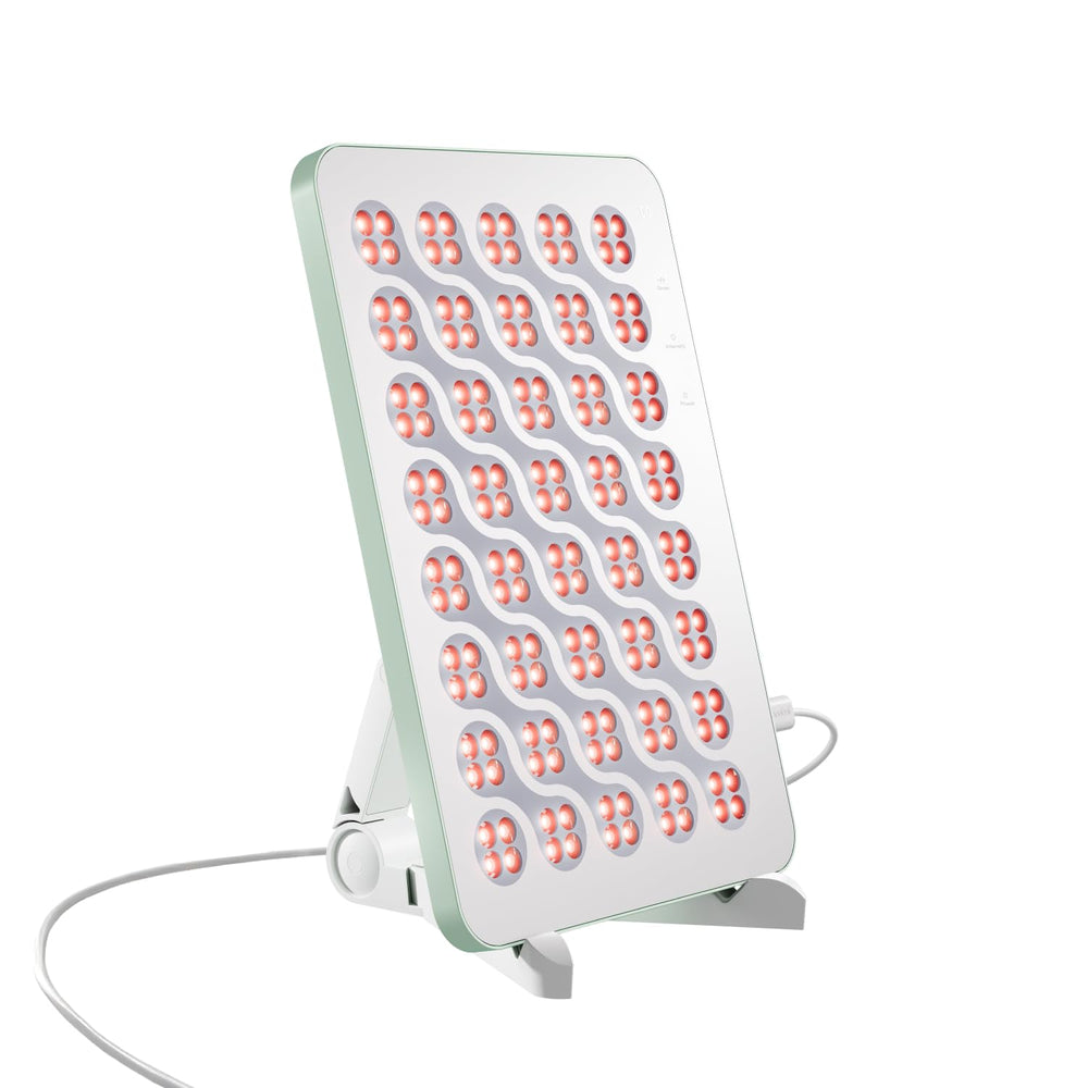 Nanoleaf red light therapy panel close-up on face for soothing facial care at home