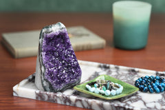 Natural amethyst crystal geode cluster showcasing raw beauty.