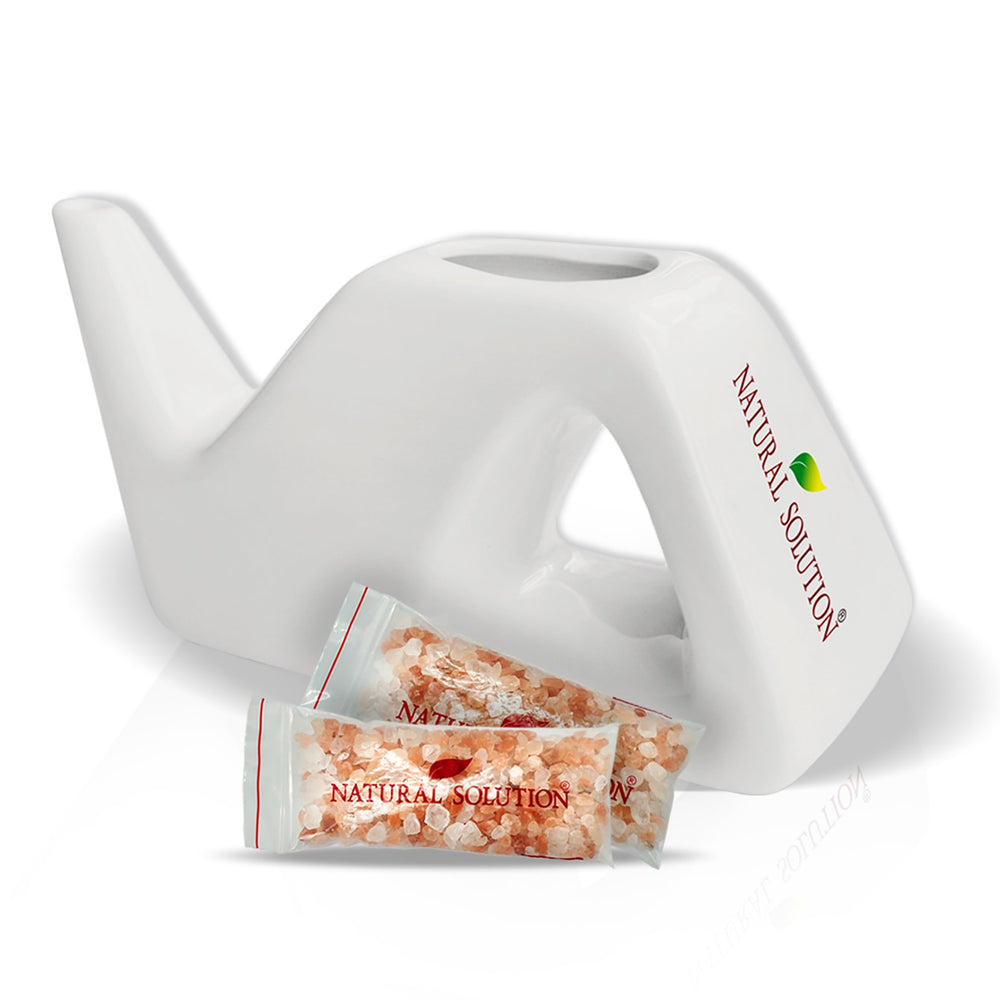 Natural Solution ceramic neti pot angled view illustrates ergonomic design for gentle nasal irrigation.